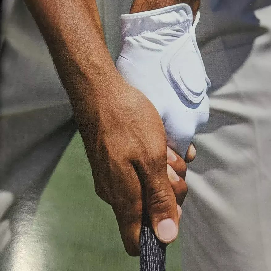 hold a golf club