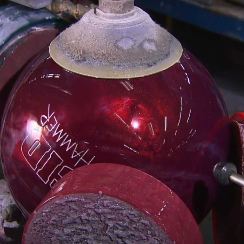 what is a bowling ball made of