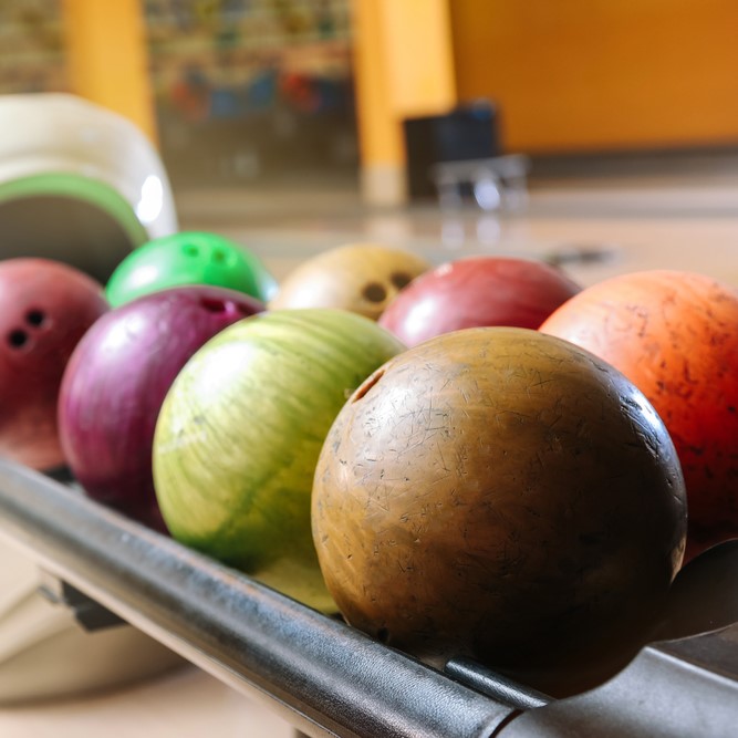 what is a bowling ball made of