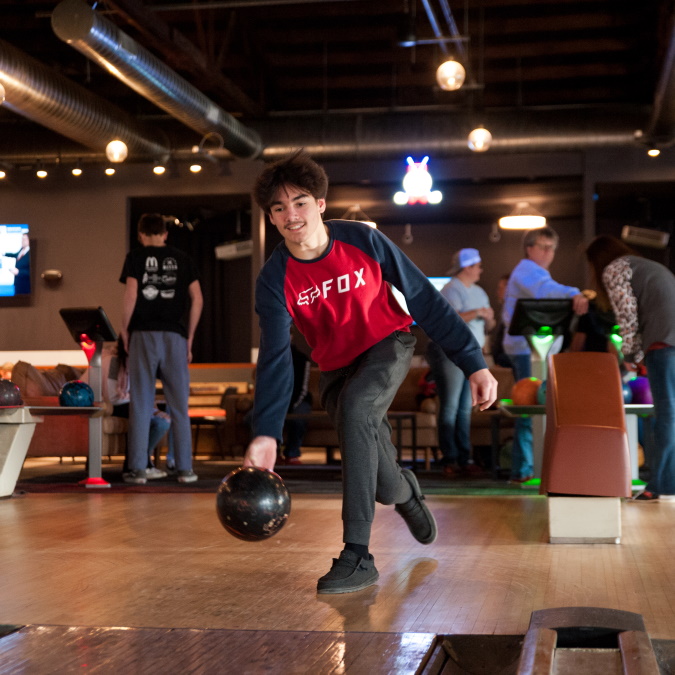 how to curve bowling ball