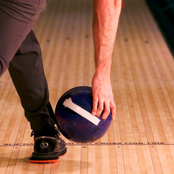 how to roll a bowling ball
